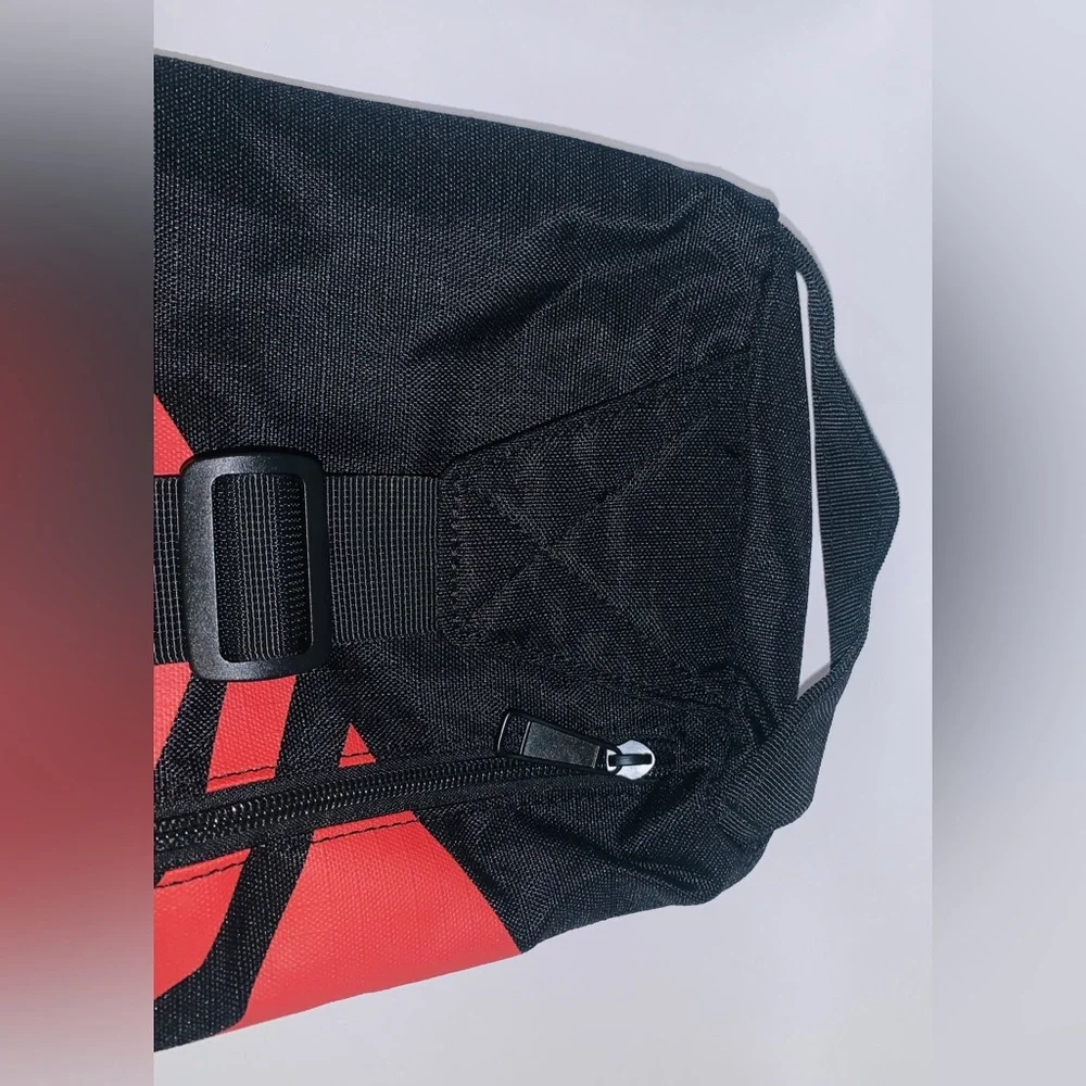 New Chipotle Mexican Grill sling back / backpack / black with red chili … - Picture 9 of 9